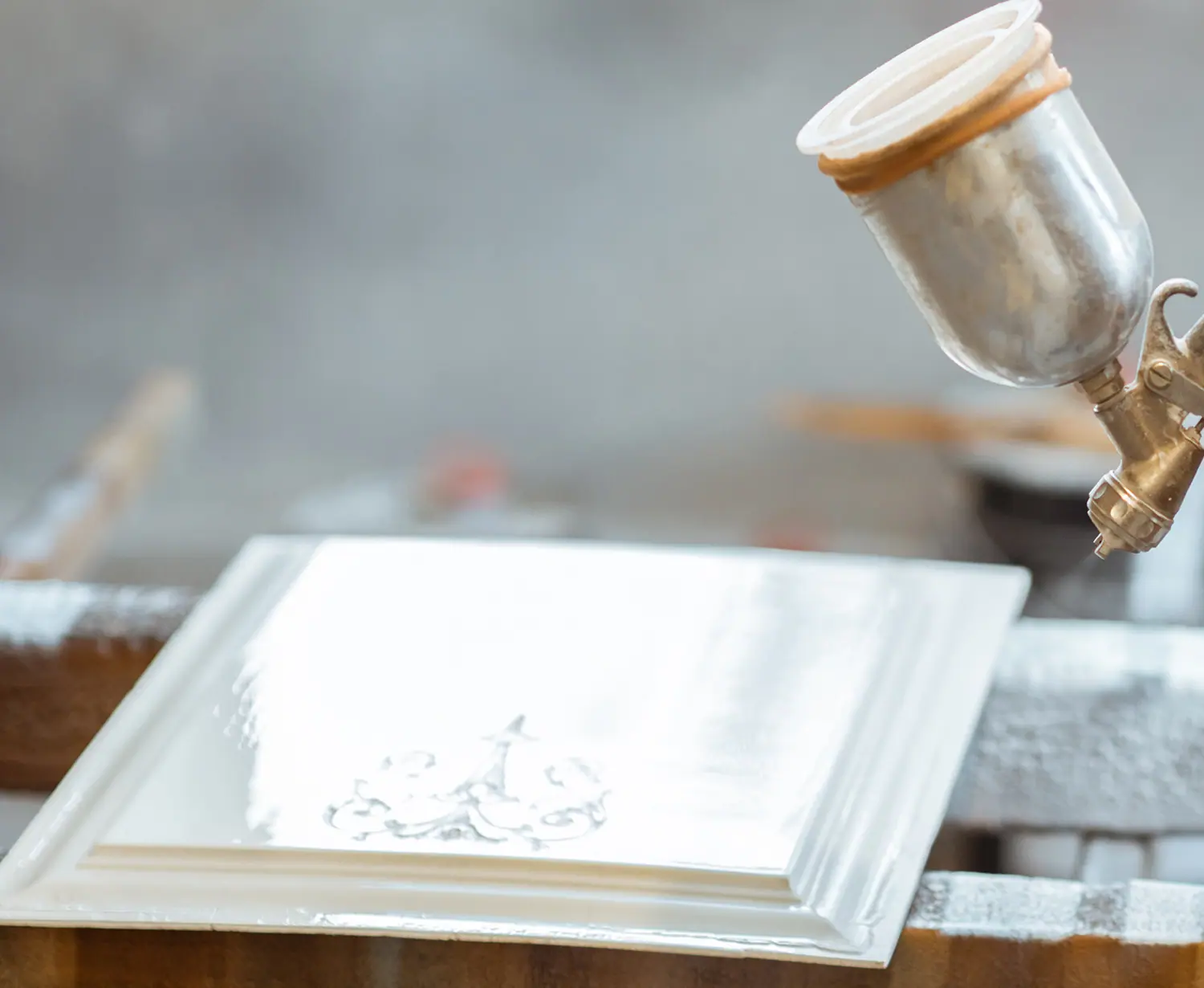 Painting the door with a spray gun